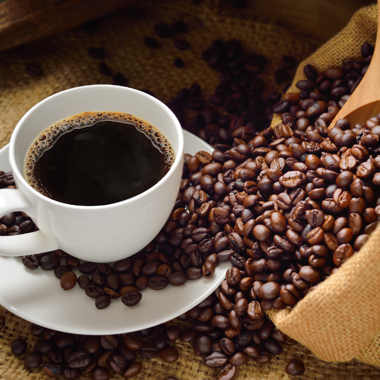 image of coffee beans and a fresh cup of coffee_what actually happens as coffee ages?